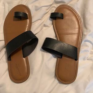 Black flip flops